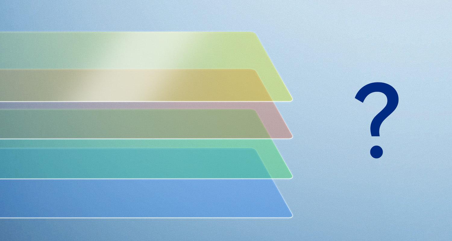 Four overlapping transparent colored layers in blue, green, yellow, and beige with a blue question mark on light blue background