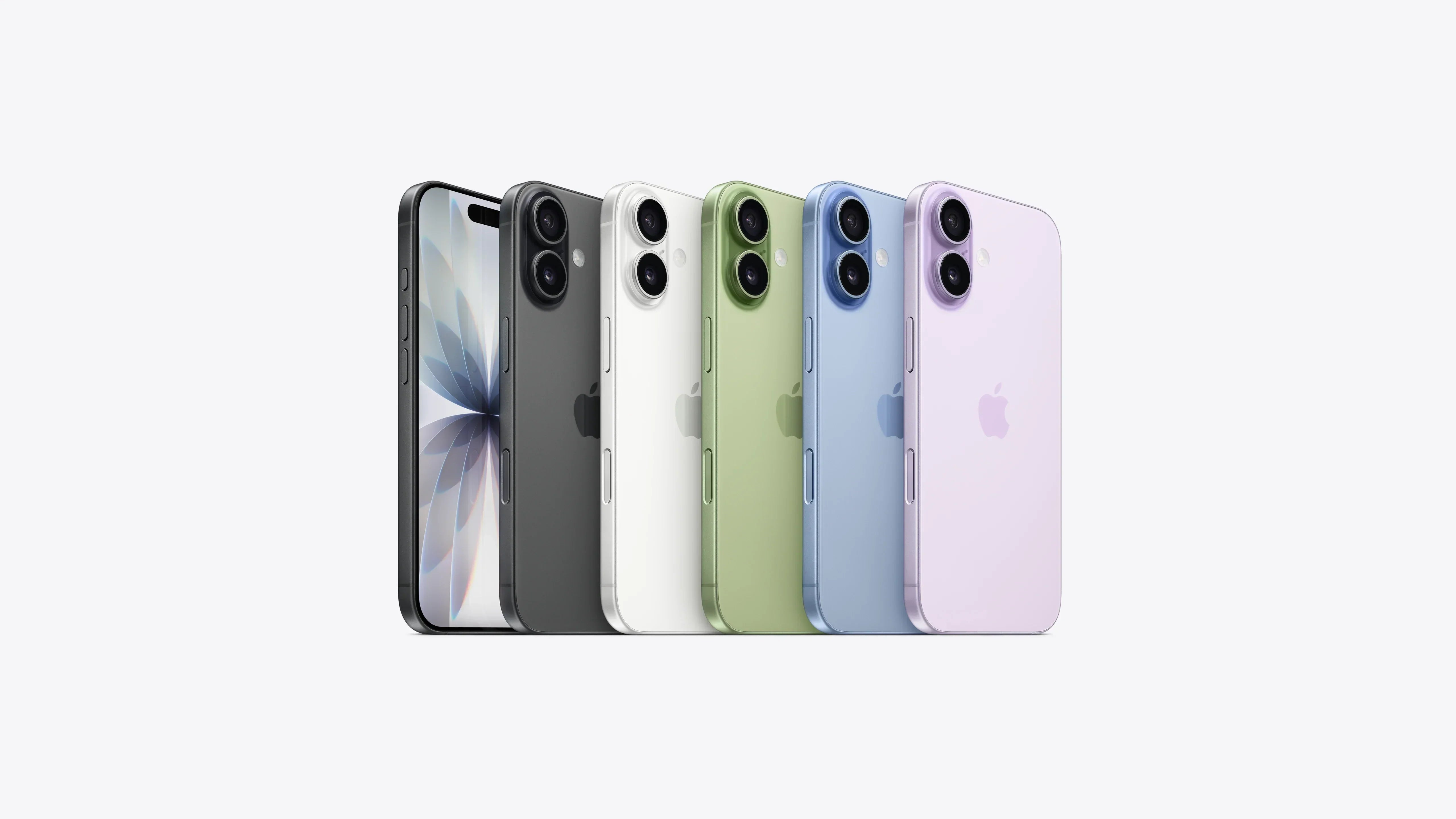 Five iPhones in black, white, green, blue, and purple colors displayed in a row on white background